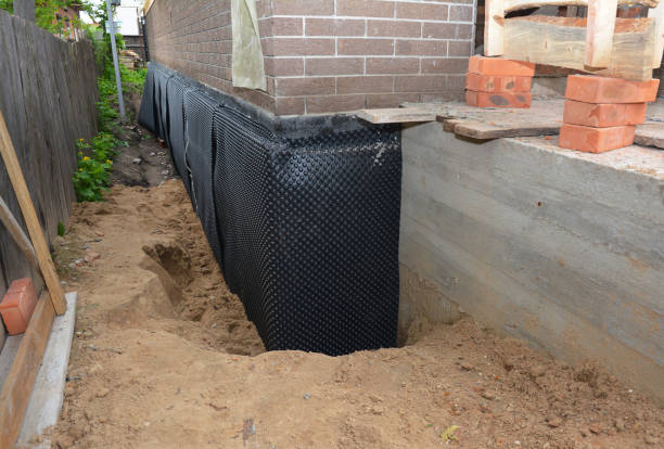 Happy homeowners after waterproofing job in Zarephath